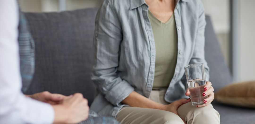 Anxious female with a counsellor